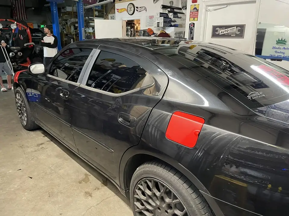2010 Dodge Charger window tint: All old tint removed, Full BLACKOUT package, 5% premium all doors and rear windshield and sunstrip, 50% premium front (view 4)