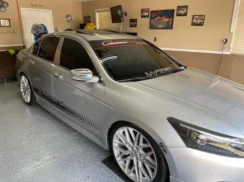 2010 Honda Accord window tint: 35% full windshield, 5% sun strip, 5% second layer over back windshield (view 3)