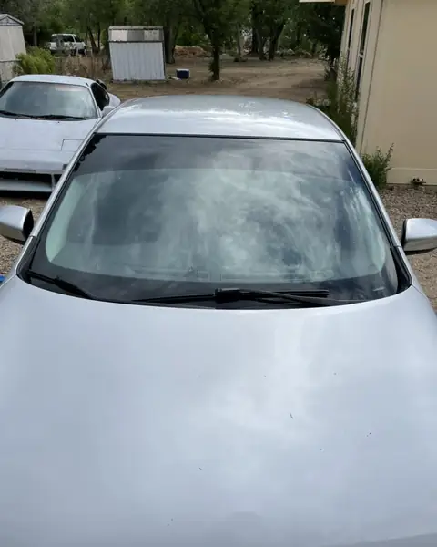 2010 Honda Civic and 2015 Nissan Sentra sun strips: 2010 Honda Civic- 5% 10inch sun strip, 2015 Nissan Sentra- 5% 10inch sunstrip (view 3)