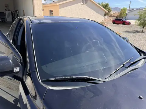 2010 Mitsubishi Lancer window tint: 50% Full windshield, 3% sunstrip and sunroof