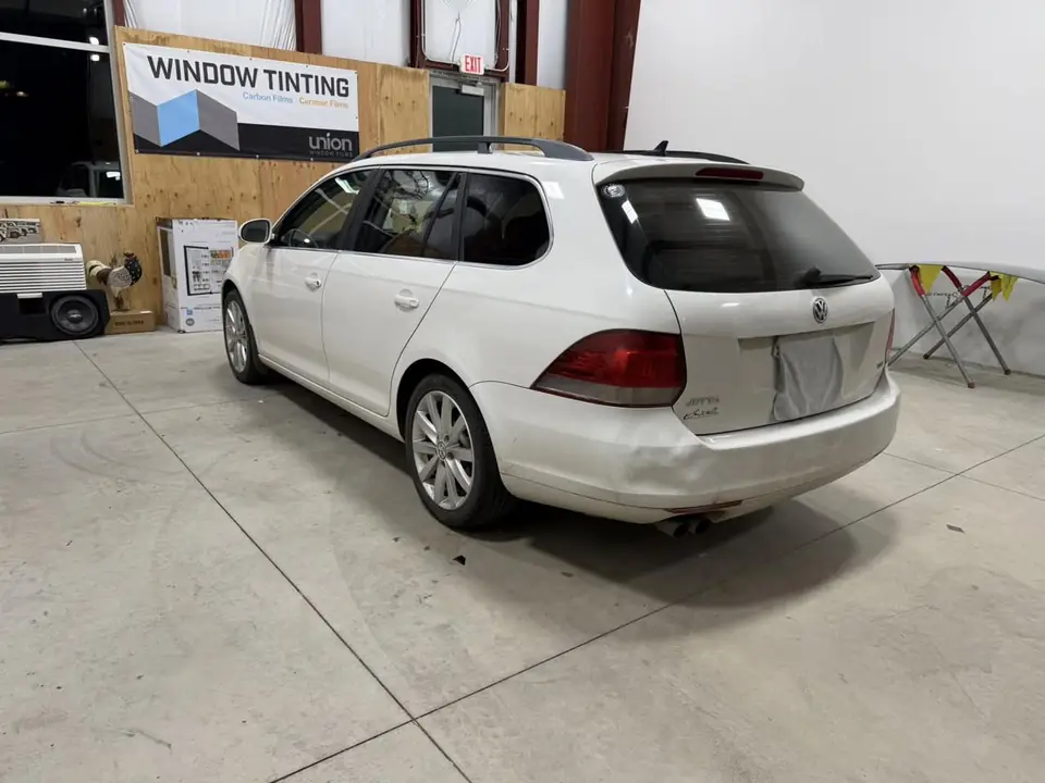 2010 Volkswagen Jetta SportWagen window tint: Old failing film removed, then retinted all around: 5% on the rear half, 20% on the front doors, and a full 35% windshield, done at the shop in Prescott Valley