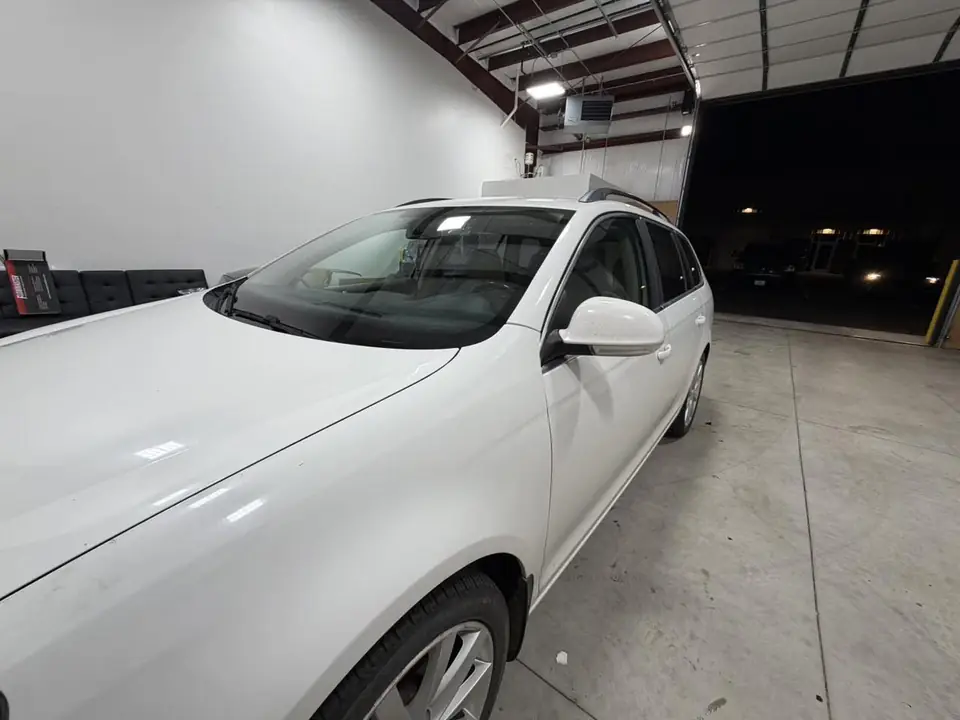 2010 Volkswagen Jetta SportWagen window tint: Old failing film removed, then retinted all around: 5% on the rear half, 20% on the front doors, and a full 35% windshield, done at the shop in Prescott Valley (view 8)