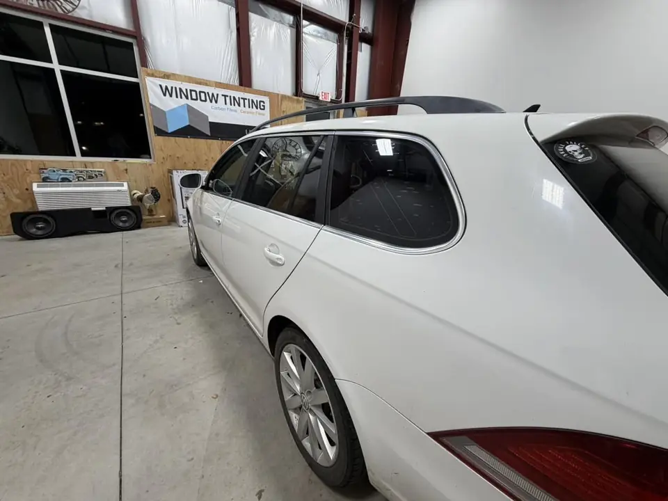 2010 Volkswagen Jetta SportWagen window tint: Old failing film removed, then retinted all around: 5% on the rear half, 20% on the front doors, and a full 35% windshield, done at the shop in Prescott Valley (view 9)