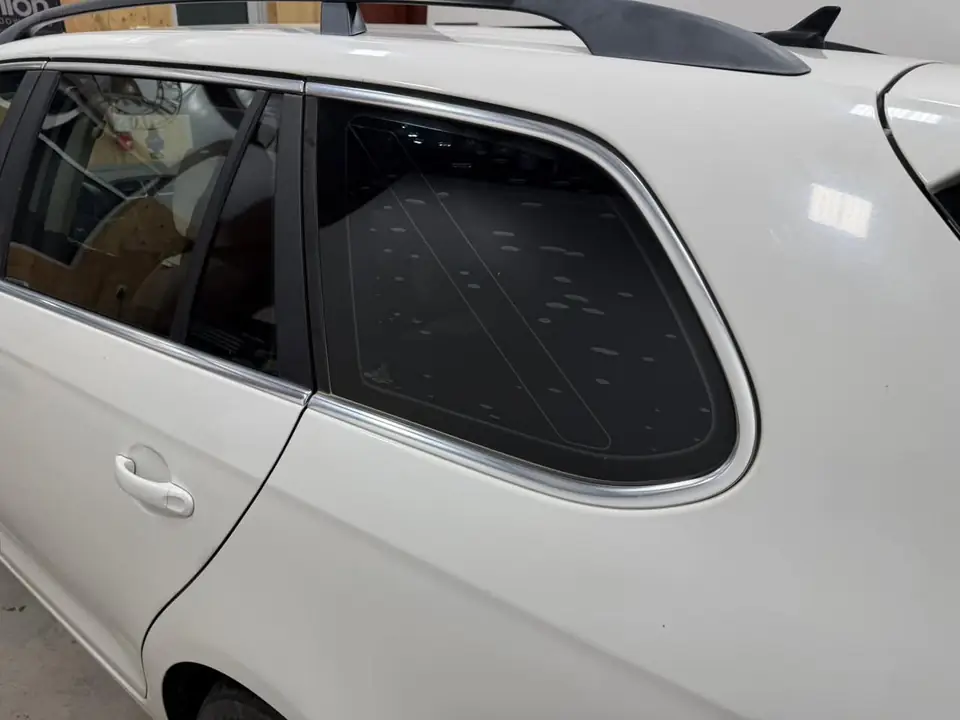 2010 Volkswagen Jetta SportWagen window tint: Old failing film removed, then retinted all around: 5% on the rear half, 20% on the front doors, and a full 35% windshield, done at the shop in Prescott Valley (view 10)