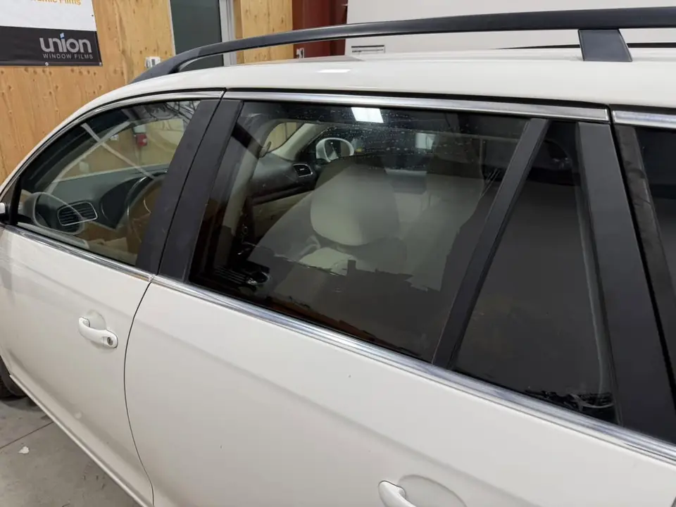 2010 Volkswagen Jetta SportWagen window tint: Old failing film removed, then retinted all around: 5% on the rear half, 20% on the front doors, and a full 35% windshield, done at the shop in Prescott Valley (view 11)