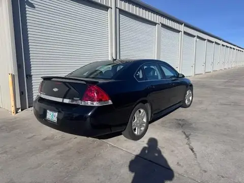 2011 Chevy Impala window tint: 5% Rear 3 Windows, Windshield Visor Strip, 35% Front Doors