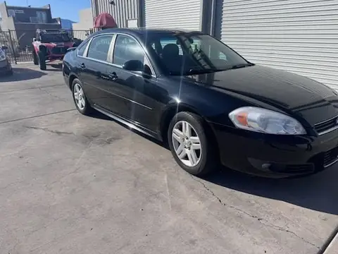2011 Chevy Impala window tint: 5% Rear 3 Windows, Windshield Visor Strip, 35% Front Doors (view 5)