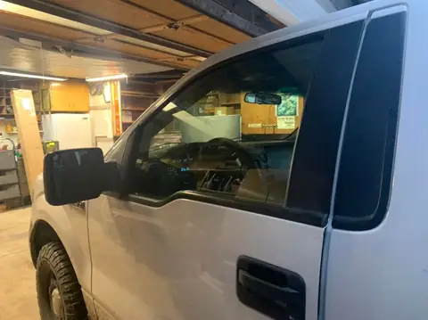2011 Ford F-150 single cab window tint: 5% rear windshield, 20% both doors, 35% full windshield (view 2)