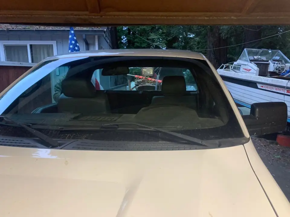 2011 Ford F-150 single cab window tint: 5% rear windshield, 20% both doors, 35% full windshield (view 3)