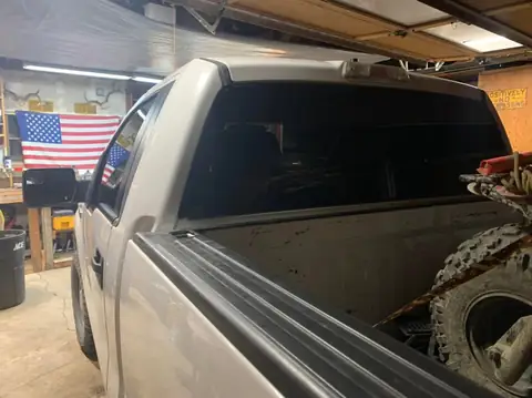 2011 Ford F-150 single cab window tint: 5% rear windshield, 20% both doors, 35% full windshield (view 4)