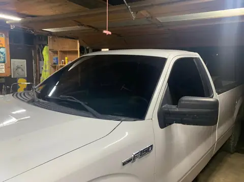 2011 Ford F-150 single cab window tint: 5% rear windshield, 20% both doors, 35% full windshield (view 5)