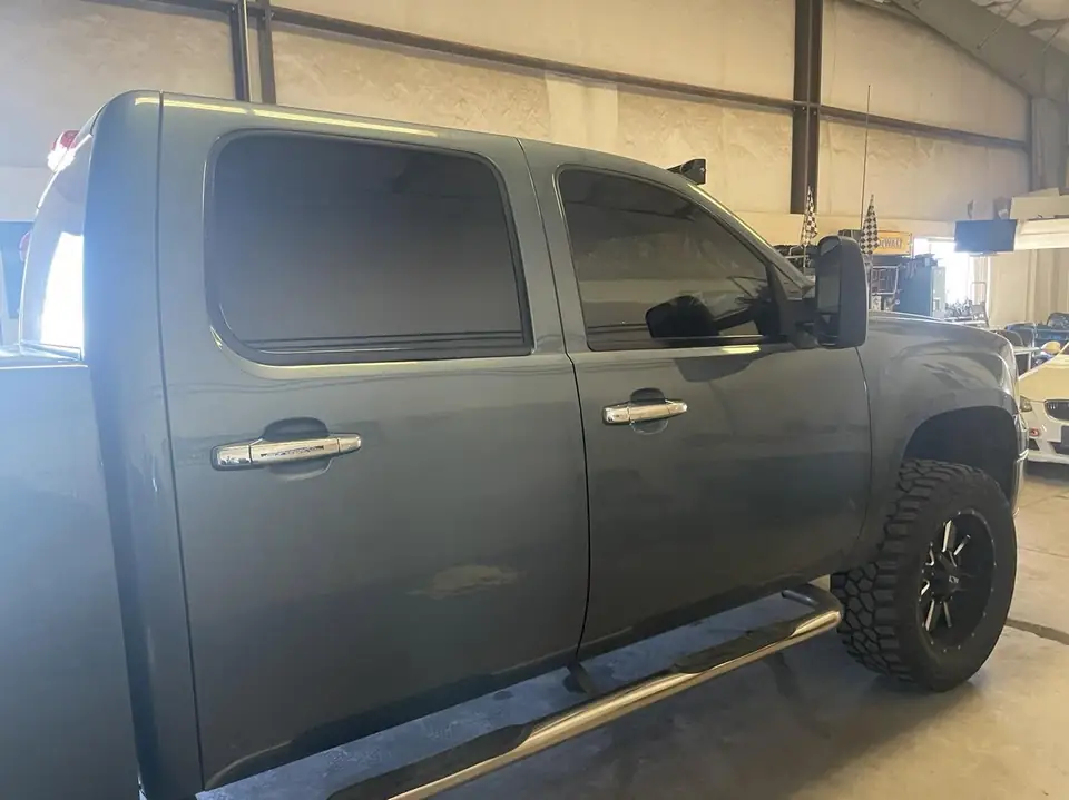 2011 GMC Sierra window tint: Old faded tint removed, 5% Standard on the rear doors and back glass, 15% Ceramic front doors (view 2)