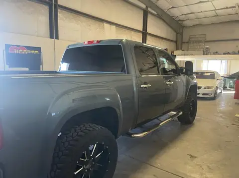 2011 GMC Sierra window tint: Old faded tint removed, 5% Standard on the rear doors and back glass, 15% Ceramic front doors (view 3)