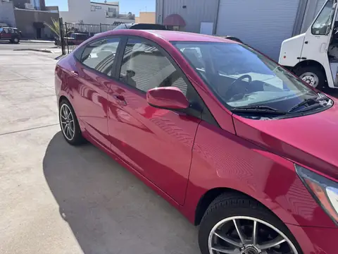 2011 Hyundai Accent window tint: 5% rear half and sunstrip, 15% front doors