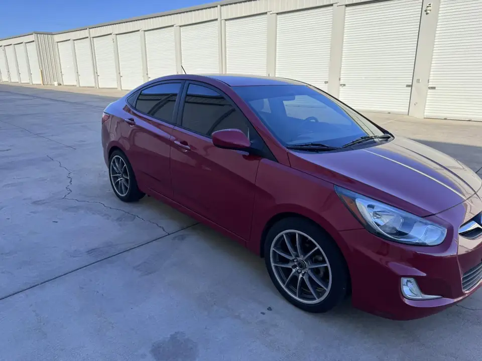 2011 Hyundai Accent window tint: 5% rear half and sunstrip, 15% front doors (view 2)