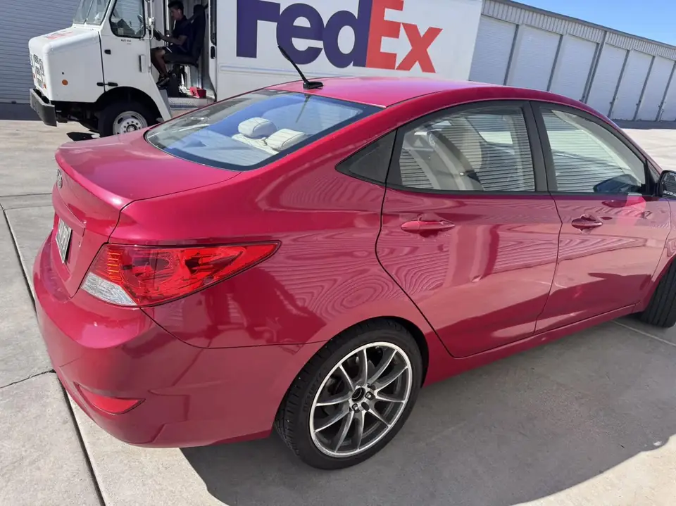 2011 Hyundai Accent window tint: 5% rear half and sunstrip, 15% front doors (view 3)