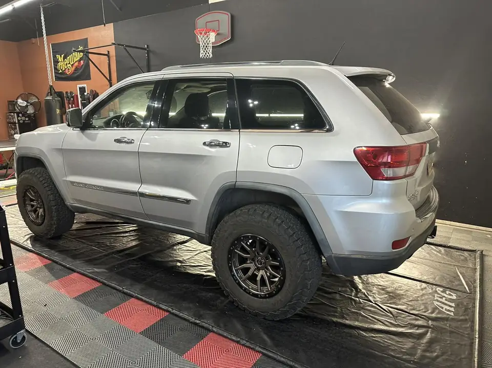 2011 Jeep Cherokee window tint: 20% Nano Ceramic rear doors, cargo windows, hatch, double moon roof, 5% Nano Ceramic front doors, 70% Nano Ceramic (view 2)