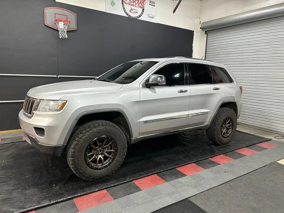 2011 Jeep Cherokee window tint: 20% Nano Ceramic rear doors, cargo windows, hatch, double moon roof, 5% Nano Ceramic front doors, 70% Nano Ceramic (view 3)