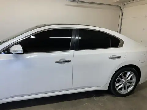 2011 Nissan Maxima window tint: Removed 5% front doors, Installed 35% Premium Ceramic