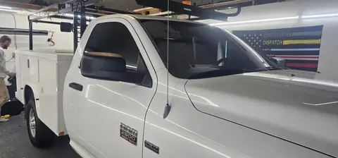 2012 Dodge Ram 2500 work truck window tint: Remove OLD tint from front door windows, Installed Limo on front 2 door windows, Installed 40% on (view 2)