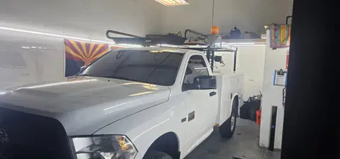 2012 Dodge Ram 2500 work truck window tint: Remove OLD tint from front door windows, Installed Limo on front 2 door windows, Installed 40% on (view 4)