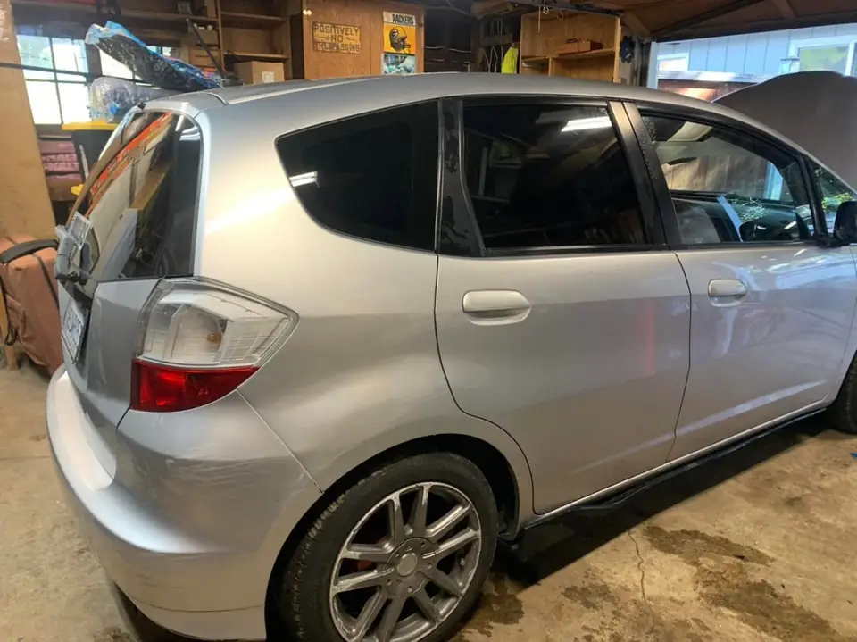 2012 Honda Fit window tint: 15% on rear doors and rear hatch (view 2)