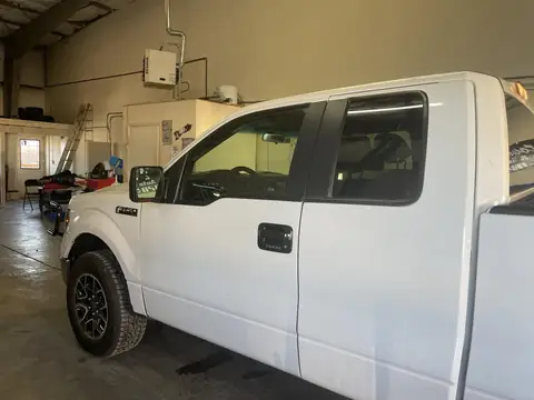 2013 Ford F-150 window tint: Standard 15% front doors to match the rear