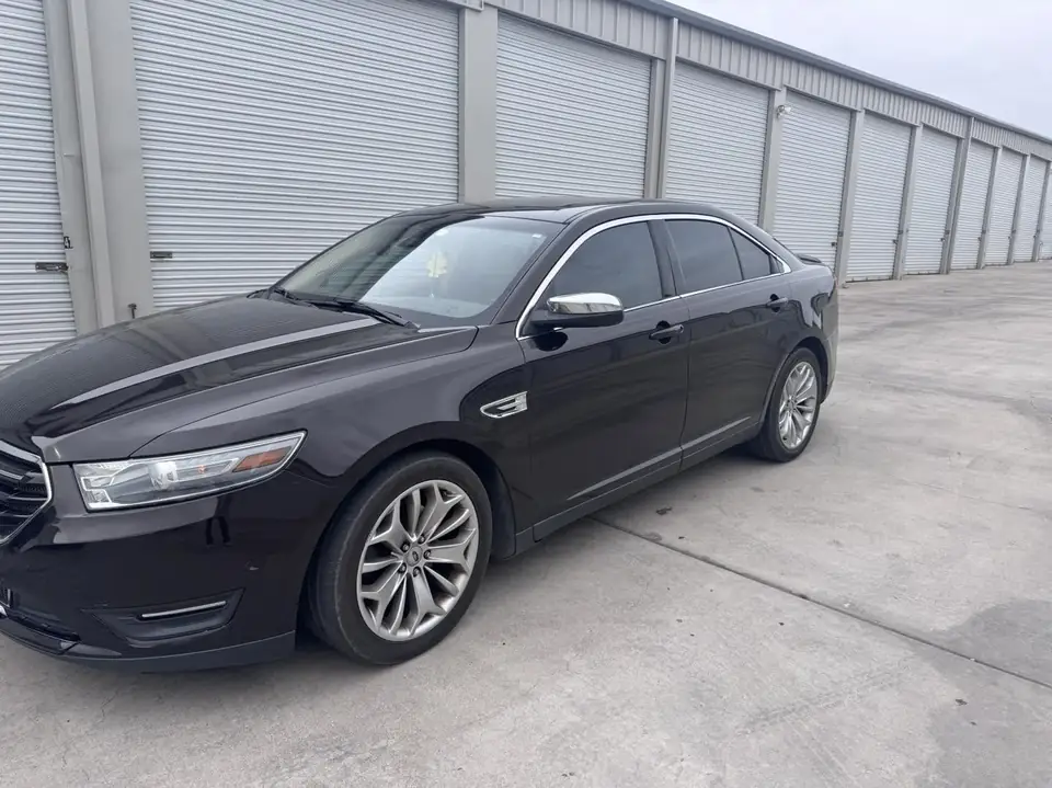 2013 Ford Taurus window tint: 15% rear doors and back window, 35% front doors (view 2)