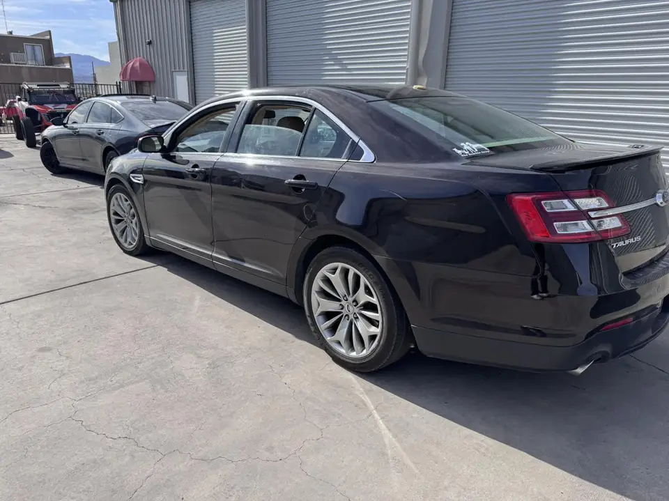 2013 Ford Taurus window tint: 15% rear doors and back window, 35% front doors (view 3)