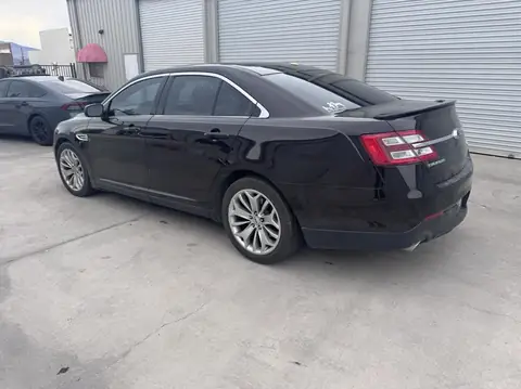 2013 Ford Taurus window tint: 15% rear doors and back window, 35% front doors (view 4)