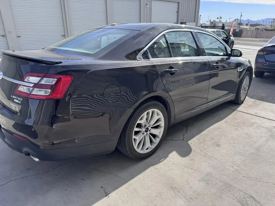 2013 Ford Taurus window tint: 15% rear doors and back window, 35% front doors (view 5)