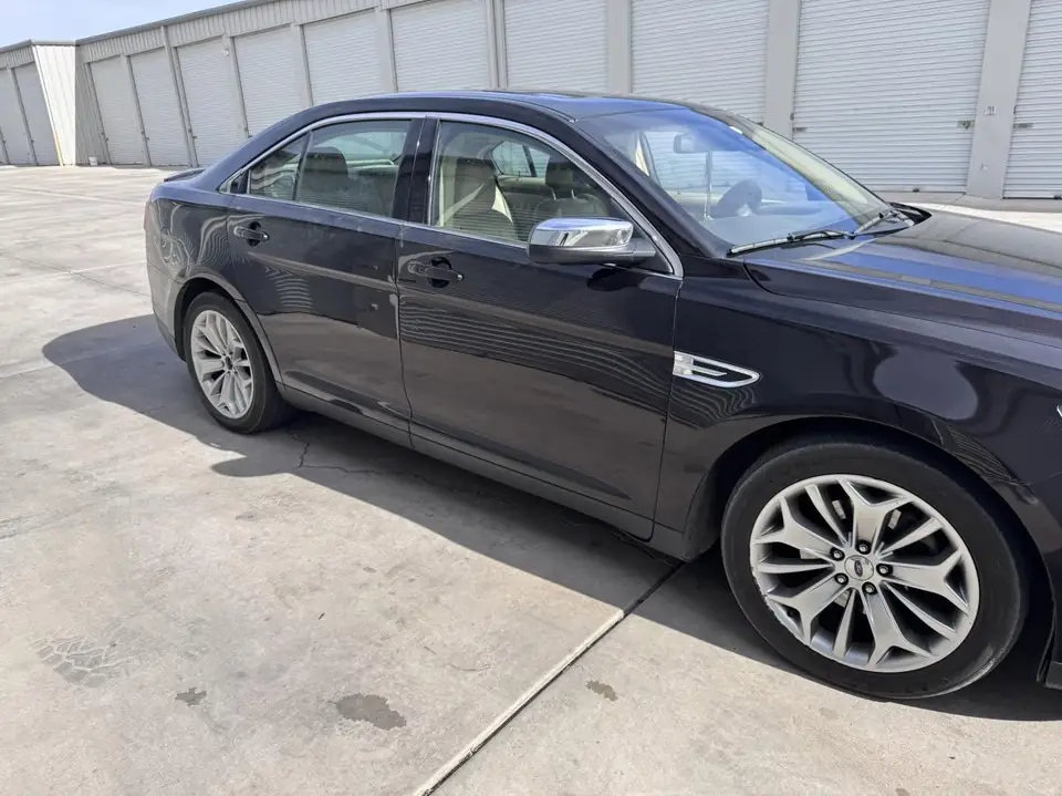 2013 Ford Taurus window tint: 15% rear doors and back window, 35% front doors (view 7)