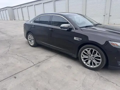 2013 Ford Taurus window tint: 15% rear doors and back window, 35% front doors (view 8)