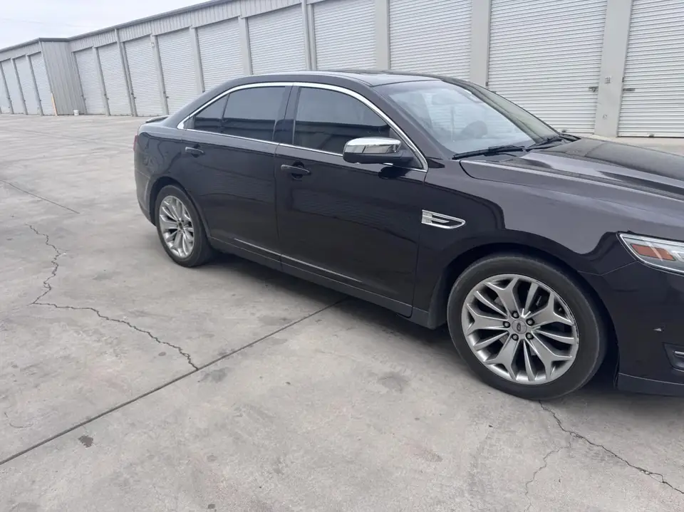 2013 Ford Taurus window tint: 15% rear doors and back window, 35% front doors (view 8)