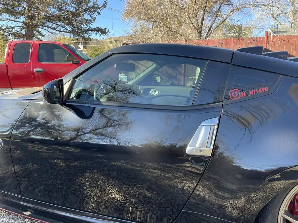 2013 Nissan 370Z window tint: Stripped front doors, Premium 5% installed, Premium 5% full windshield (view 2)
