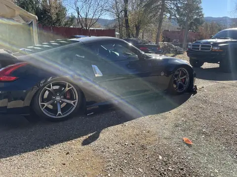 2013 Nissan 370Z window tint: Stripped front doors, Premium 5% installed, Premium 5% full windshield (view 3)