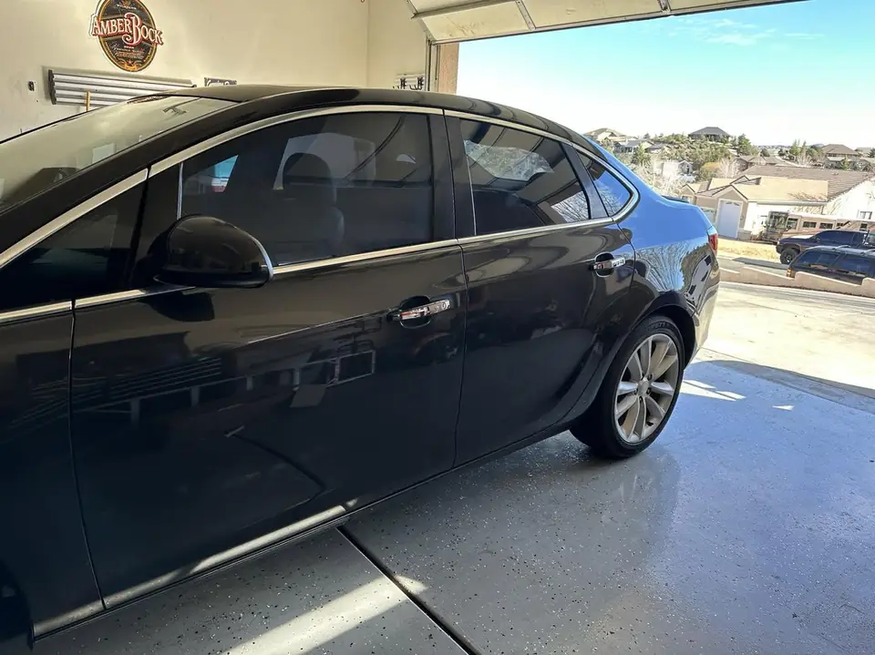 2014 Buick window tint: Strip all side windows, 5% Nano carbon back window, front/rear corner windows, 15% Nano ceramic roll ups, 5% windshield strip (view 2)