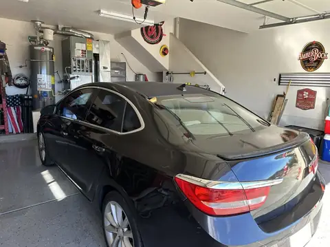2014 Buick window tint: Strip all side windows, 5% Nano carbon back window, front/rear corner windows, 15% Nano ceramic roll ups, 5% windshield strip (view 3)