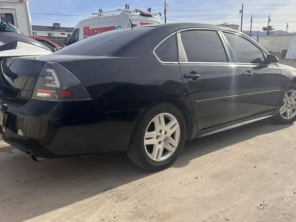 2014 Chevy Impala window tint: 3% all sides and rear, 50% full windshield, 3% windshield strip, 5% sunroof (view 2)
