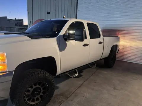 2014 Chevy Malibu and 2013 Chevy Silverado window tint: 2014 Chevy Malibu: full removal of old film, new 5% C-IR sides and rear window, 2013 Chevy (view 3)