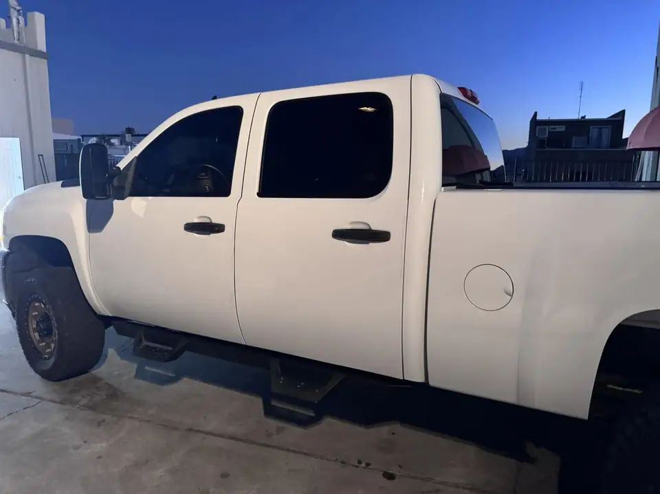 2014 Chevy Malibu and 2013 Chevy Silverado window tint: 2014 Chevy Malibu: full removal of old film, new 5% C-IR sides and rear window, 2013 Chevy (view 4)