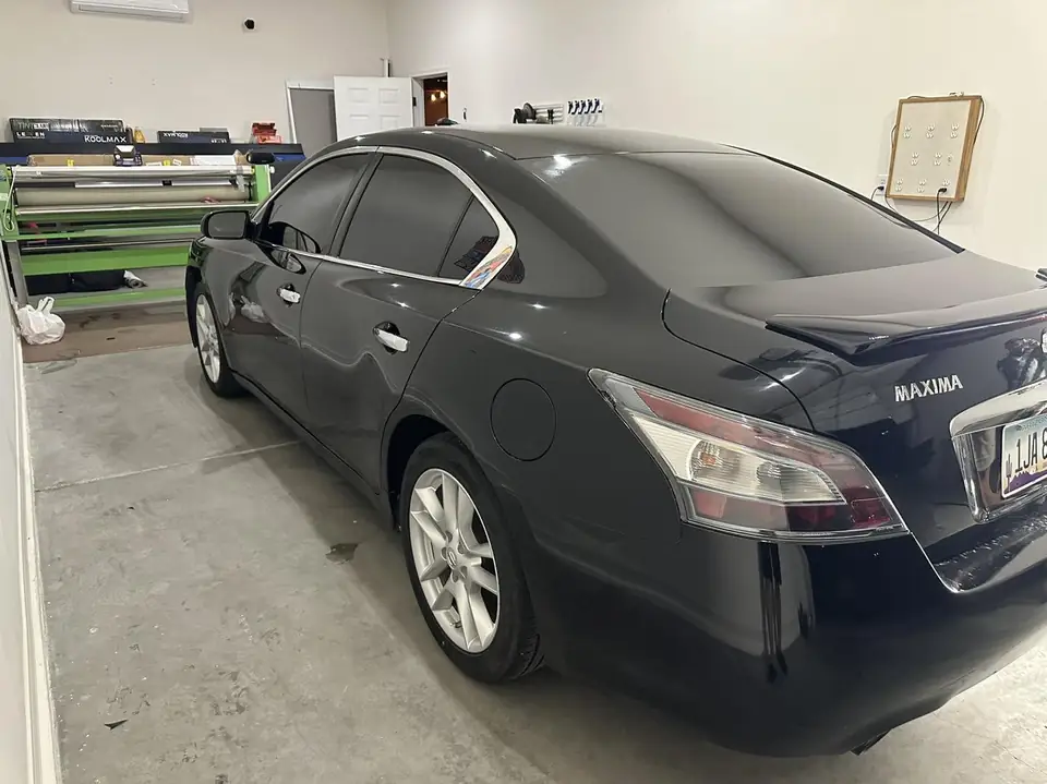 2014 Nissan Maxima window tint: Full protection ceramic package, 5% rear 3 windows, 15% front 2 windows, 70% full windshield, 5% windshield strip (view 2)