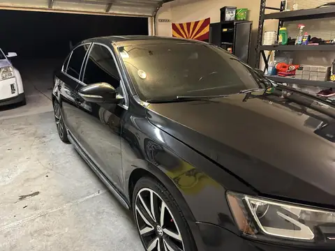 2014 VW Jetta GLI window tint: Strip all faded bubbly tint, 5% Nano Carbon 4 doors and back glass, 50% Nano Ceramic full windshield, 5% Windshield