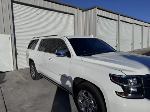 2015 Chevy Suburban window tint: 15% Over the rear half privacy windows (1% read), 5% front doors and sunstrip