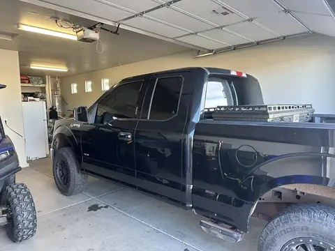 2015 Ford F-150 window tint: Strip all the old tint, 5% Ceramic rear 3 windows, 15% Ceramic front 2 windows