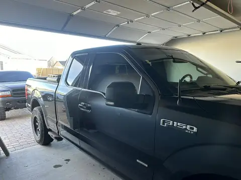 2015 Ford F-150 window tint: Strip all the old tint, 5% Ceramic rear 3 windows, 15% Ceramic front 2 windows (view 2)