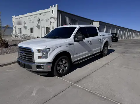 2015 Ford F-150 window tint: 5% sides and rear and tied in with a 13inch sunstrip (view 2)