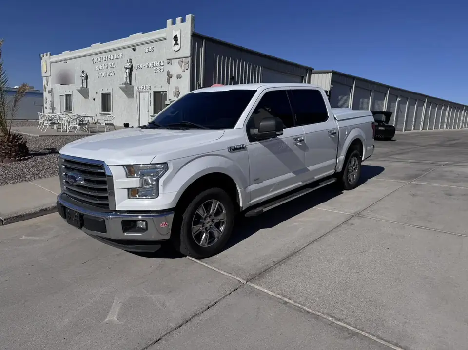 2015 Ford F-150 window tint: 5% sides and rear and tied in with a 13inch sunstrip (view 2)