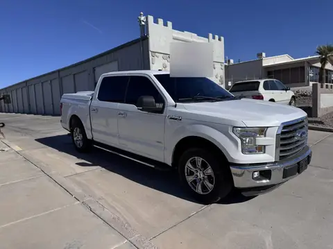 2015 Ford F-150 window tint: 5% sides and rear and tied in with a 13inch sunstrip (view 3)