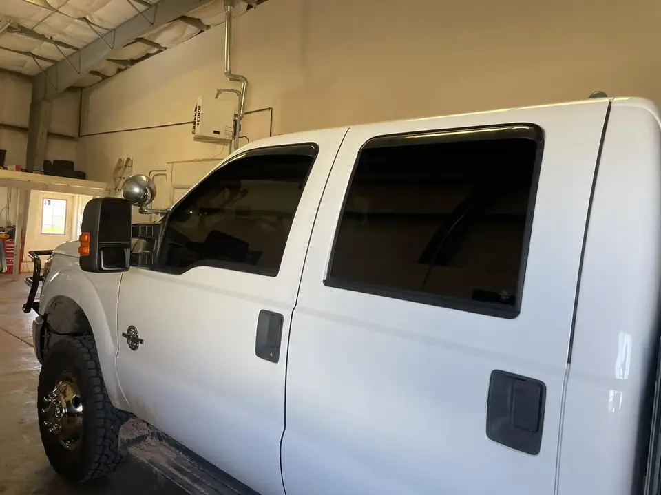 2015 Ford F-350 window tint: Premium 5% rear 3 windows, Premium 15% front windows, 5% windshield strip (view 2)